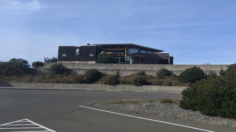 Outside the Welcome Center for Crissey Field State Recreation Site with blue sky