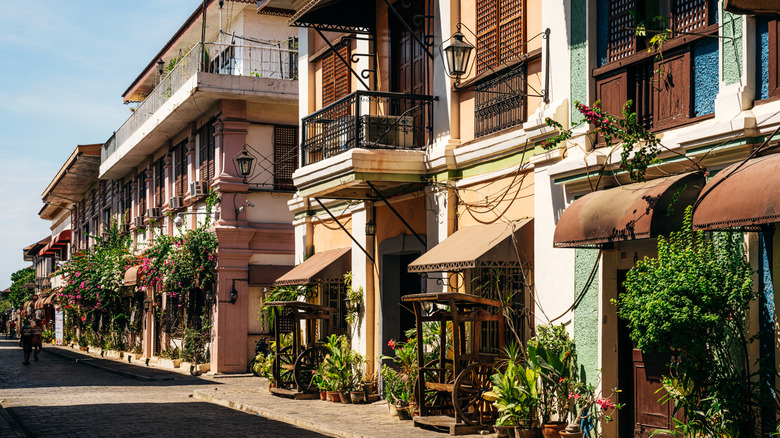 Street view of plant adorned buildings in Vigan City in the Philippines.