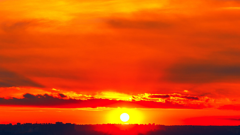 An orange and red sky as the sun sets