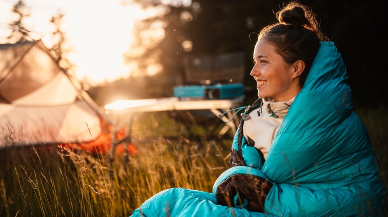 woman smiling camping
