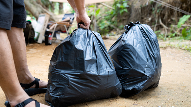 tied trash bags camping