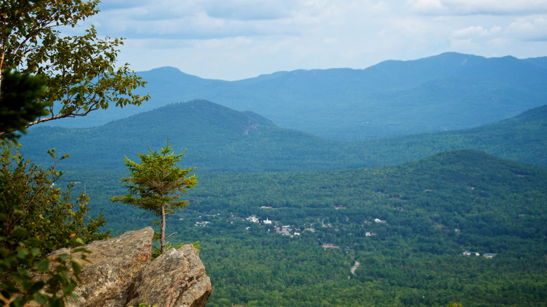 Beautiful scenic landscape view of the Adirondack mountains from the top of Cobble Lookout in Wilmington, New York on a summer afternoon