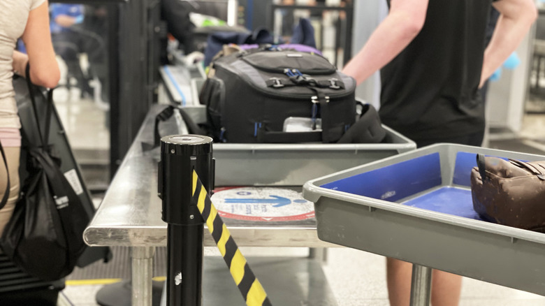 Passengers going through airport security