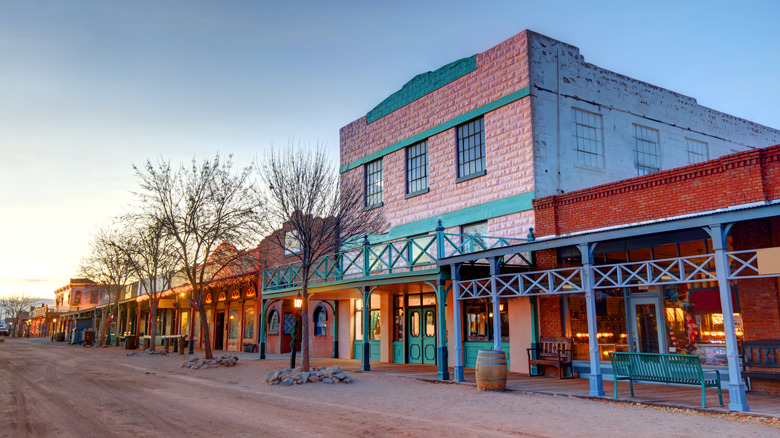 Historic businesses and newer shops meet on the main street in Tombstone, Arizona