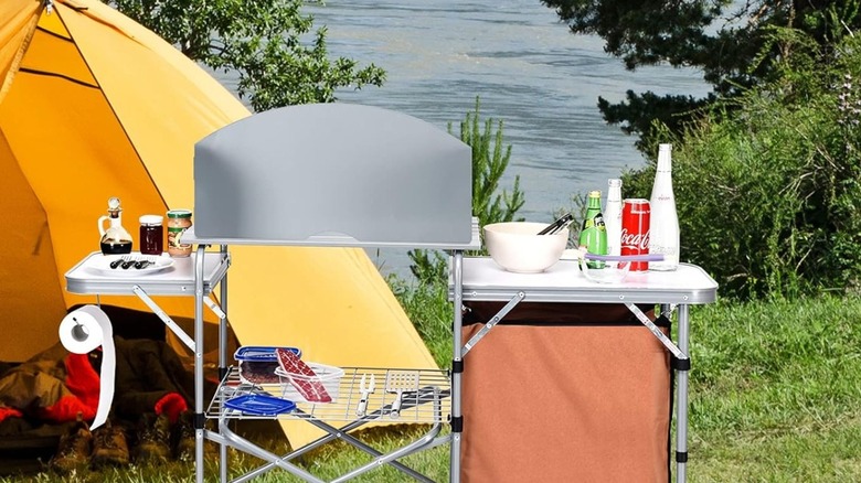 A camping kitchen station setup outdoors