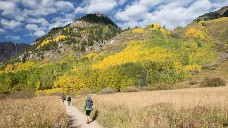 Hikers at Maroon Bells Scenic Area in Pitkin County, Colorado