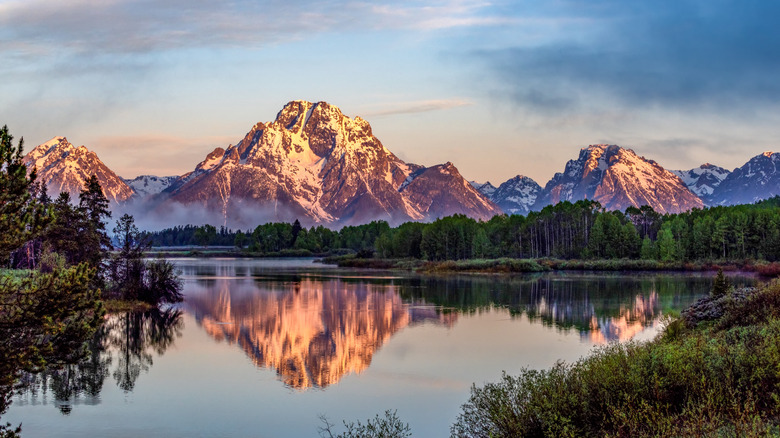The Grand Teton Mountain Range in the national park at sunrise