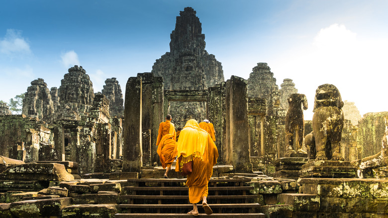 Monks walking in Cambodia's Bayon Temple