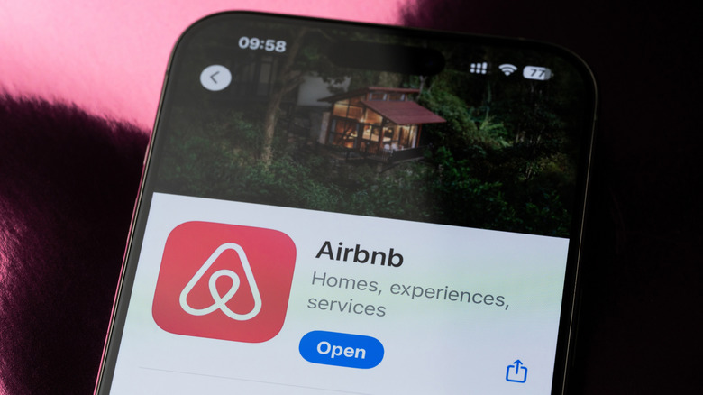 Close up of the Airbnb app open on a mobile phone