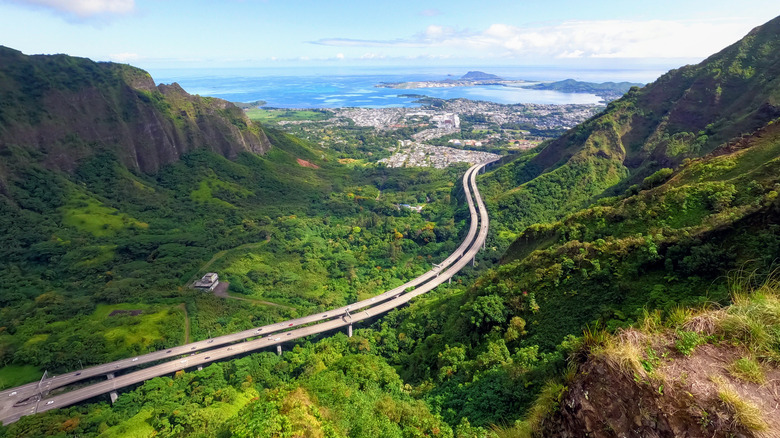 H3 Saddle Freeway through lush greenery in Oahu, Hawaii