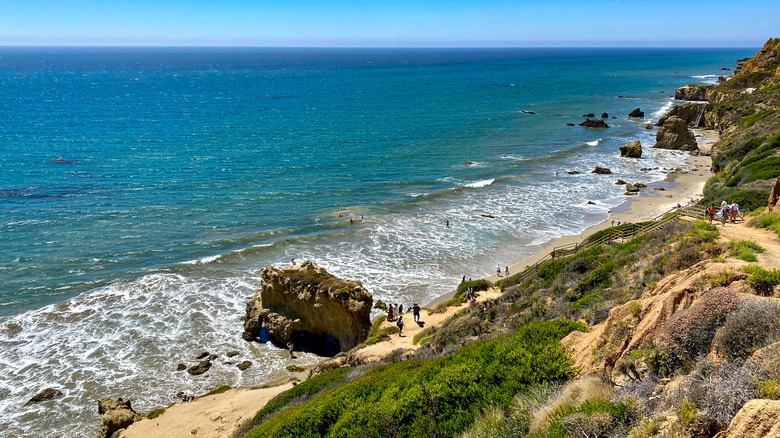 Waves splashing against the rocky El Matador Beach in Malibu, California