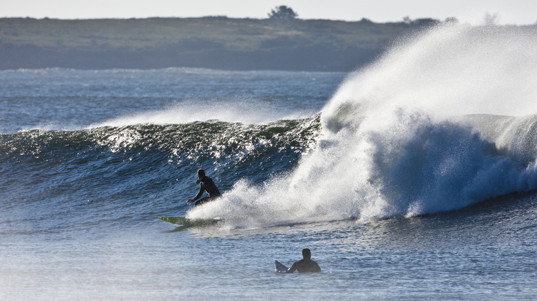Two surfers in Newport, Rhode Island