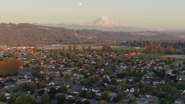 aerial view over sumner's residential neighborhood with Mt Rainier in the background on the horizon