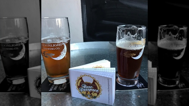 Two glasses of beer and a beer passport at the Moonlight Brewing Company