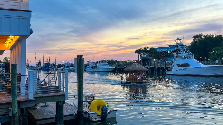 Shem Creek waterfront building at dusk