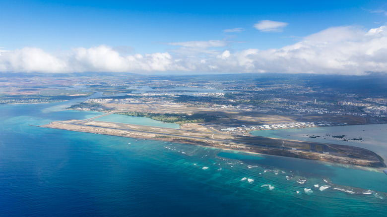 Aerial photo of Reef Runway at Daniel K. Inouye International Airport in Honolulu, Hawaii