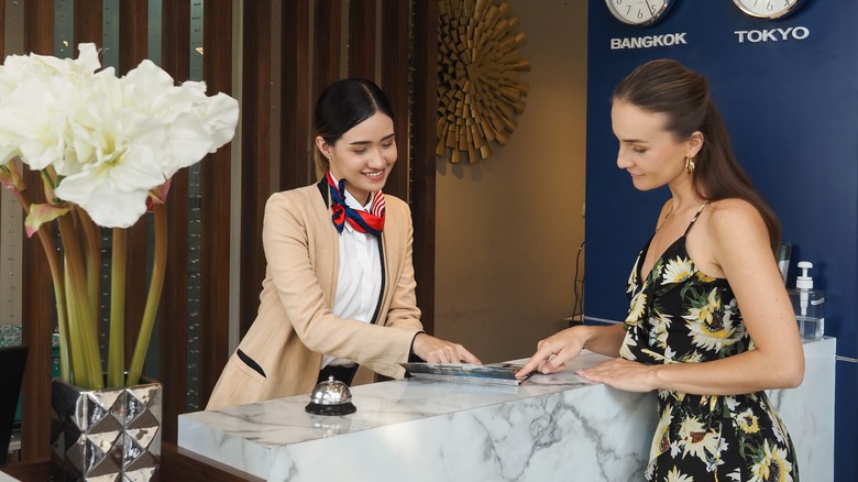 Hotel staff upselling to guest