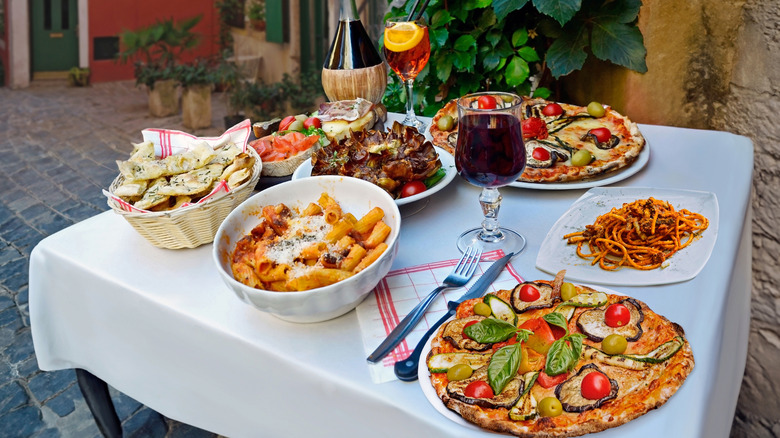 Italian dinner spread on a table outside