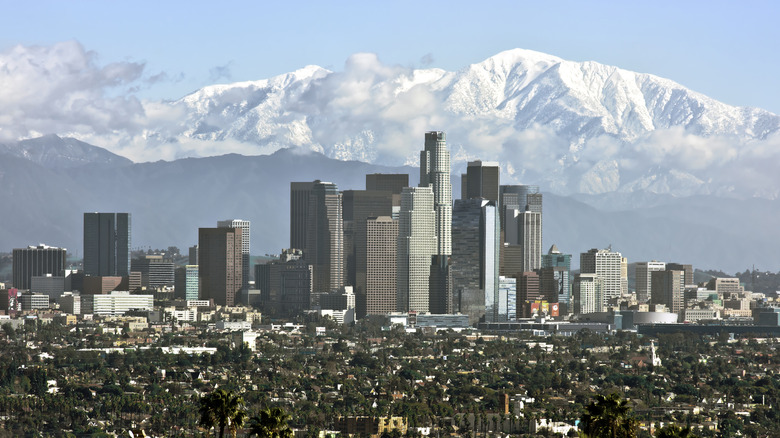 Los Angeles, California skyline with snow-capped Mt. Baldy behind