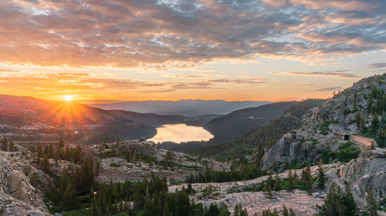 View from above Donner Lake at sunset, colors reflecting on the lake's surface