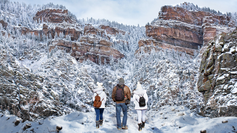 Family against the winter landscape of Glenwood Springs, Colorado