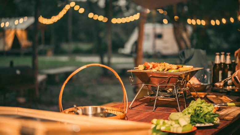 Meal on outdoor table at campsite