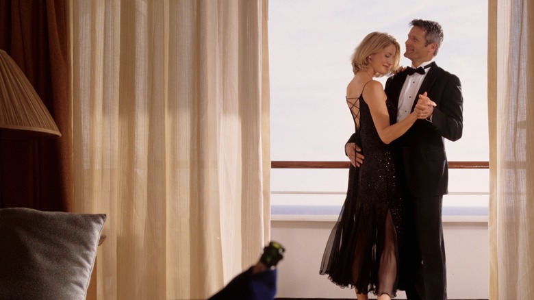A couple in a romantic cruise ship cabin