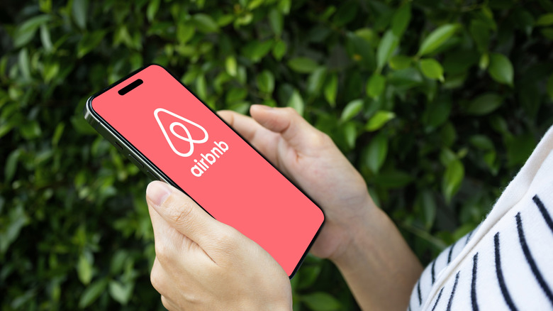 A person using the Airbnb app