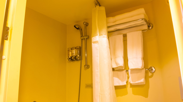 Cruise cabin bathroom with shower curtain