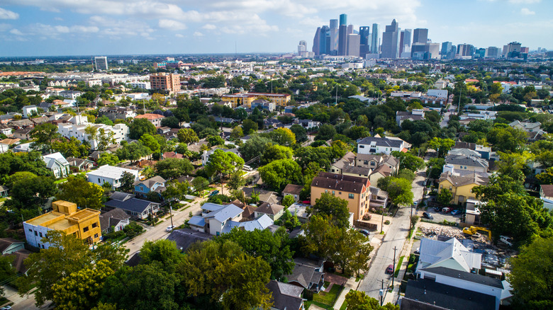 aerial view of Montrose neighborhood in Texas with Houston skyline in distance