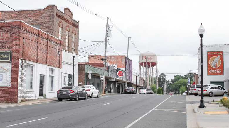 Street and water tower in downtown Minden, Louisiana