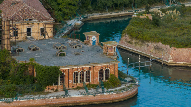 Aerial view of the plagued ghost island of Poveglia in the Venetian lagoon