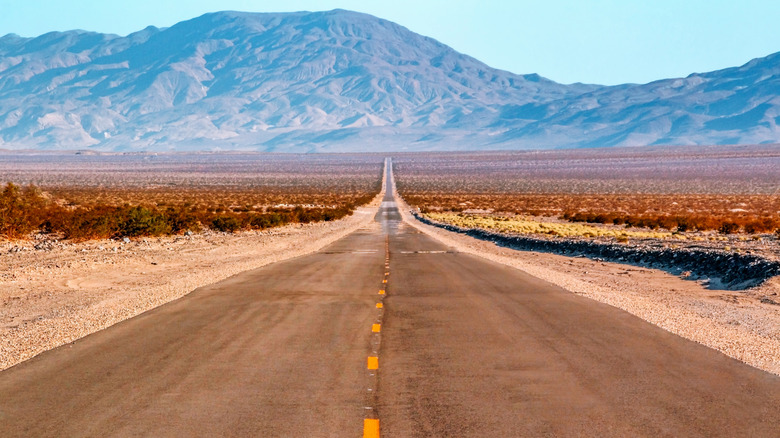 A road leads through the Death Valley National Park
