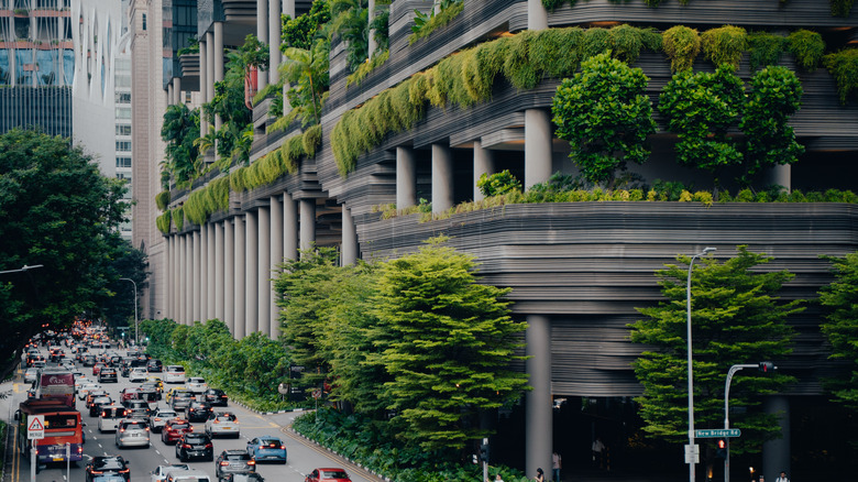 An example of modern sustainable architecture and greenery in Singapore among traffic