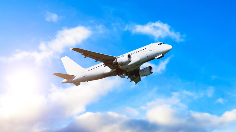 White airplane against the sky