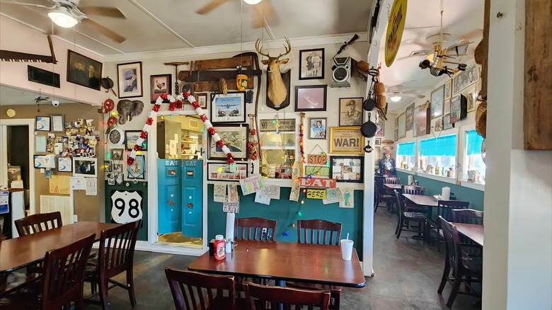 Tables and wall decor inside R'Reileigh's