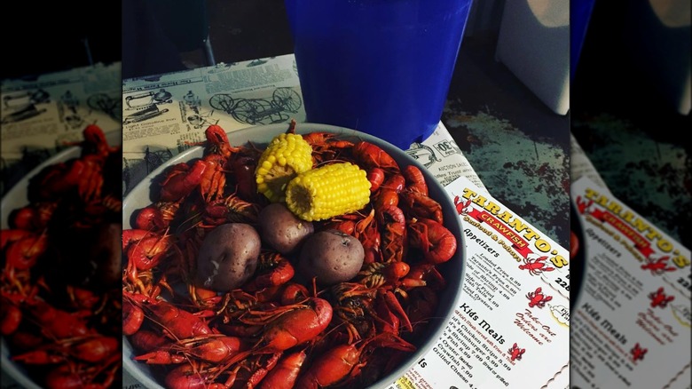 red crawfish boil with corn and potatoes