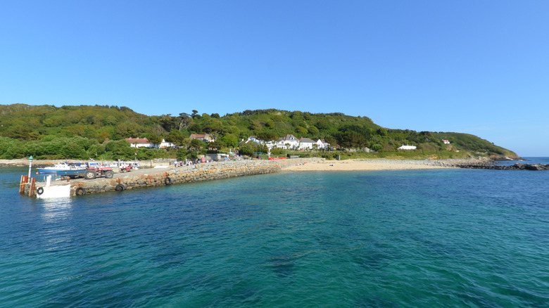 The lush island of Herm in the English Channel seen from the water