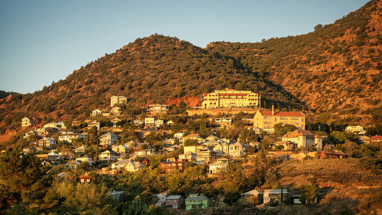 Jerome, Arizona buildings built into hill at sunset