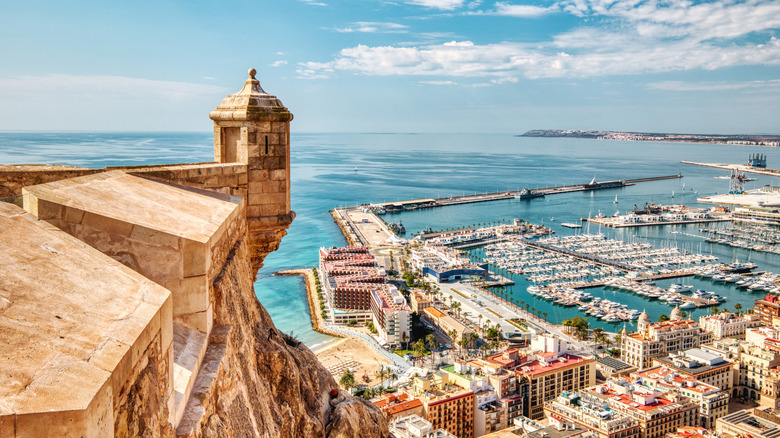 Castle turret overlooking marina in Alicante, Spain