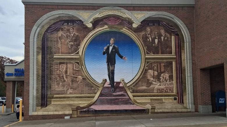 Dean Martin mural painted on a tan brick wall in Steubenville, Ohio