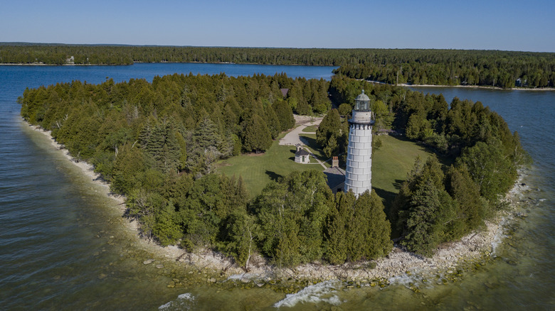 The iconic Cana Island Lighthouse on Cana Island in Lake Michigan