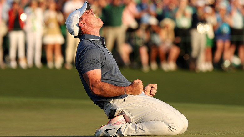 Rory McIlroy of Northern Ireland celebrates winning the 2025 Masters Tournament.