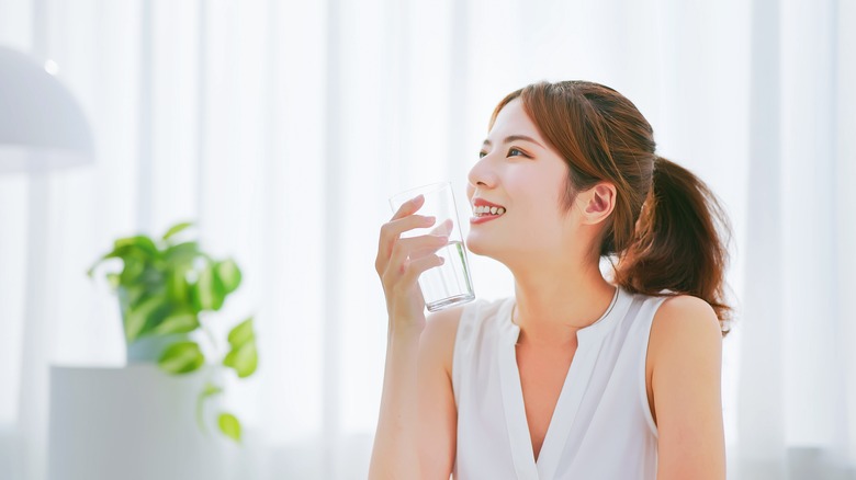 A woman drinking water