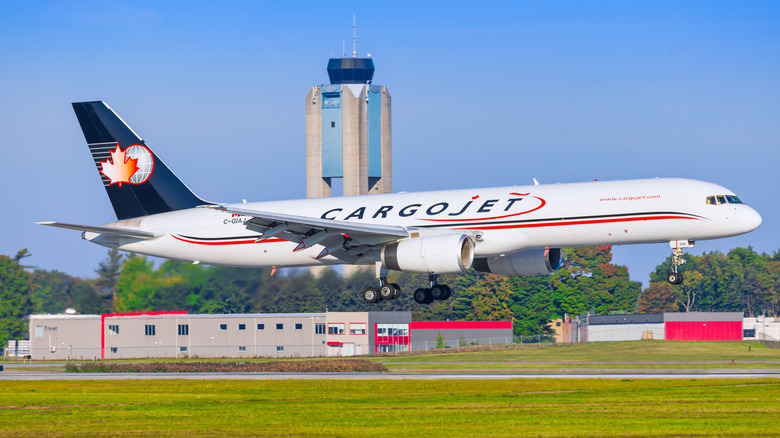 A cargo jet lands on the runway at Mirabel International Airport