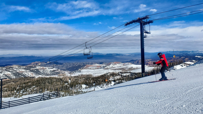 Skiier and chairlift at Brian Head Ski Resort