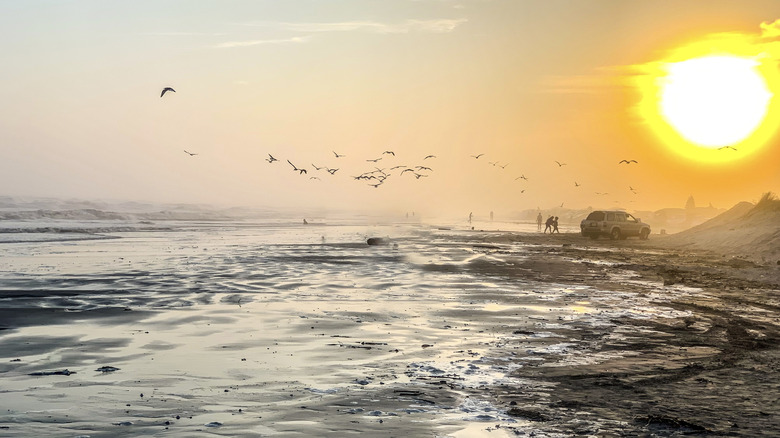 The sun setting on a Freeport, Texas beach