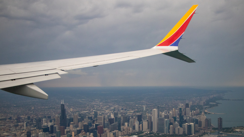 A Southwest Airline plane flying over Chicago
