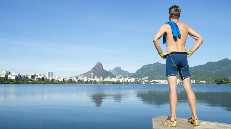 Man in a jammer-style swimsuit