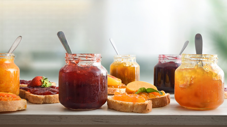 Various jars of colorful jellies